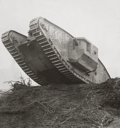 A Tank Leads the Infantry into Action and Breaks Down the Wire Entanglements